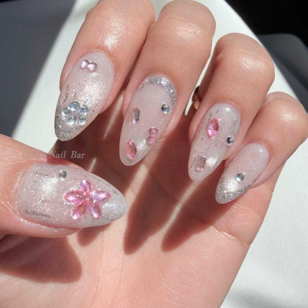rhinestone and 3D flower nail art on gel x extensions
